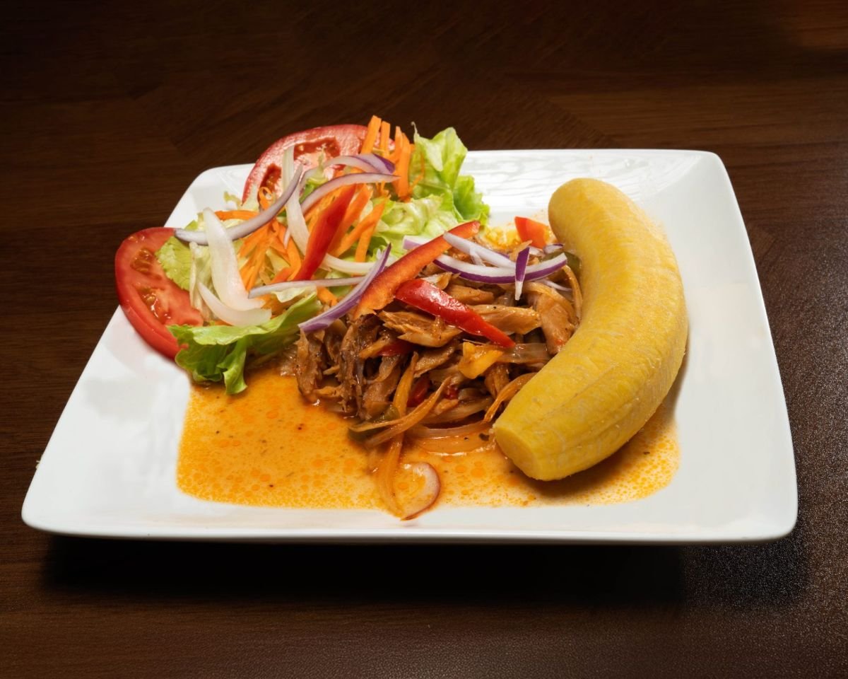 Haitian plantain et morue, saltfish with boiled plantain and fresh salad at Chez Le Bebe